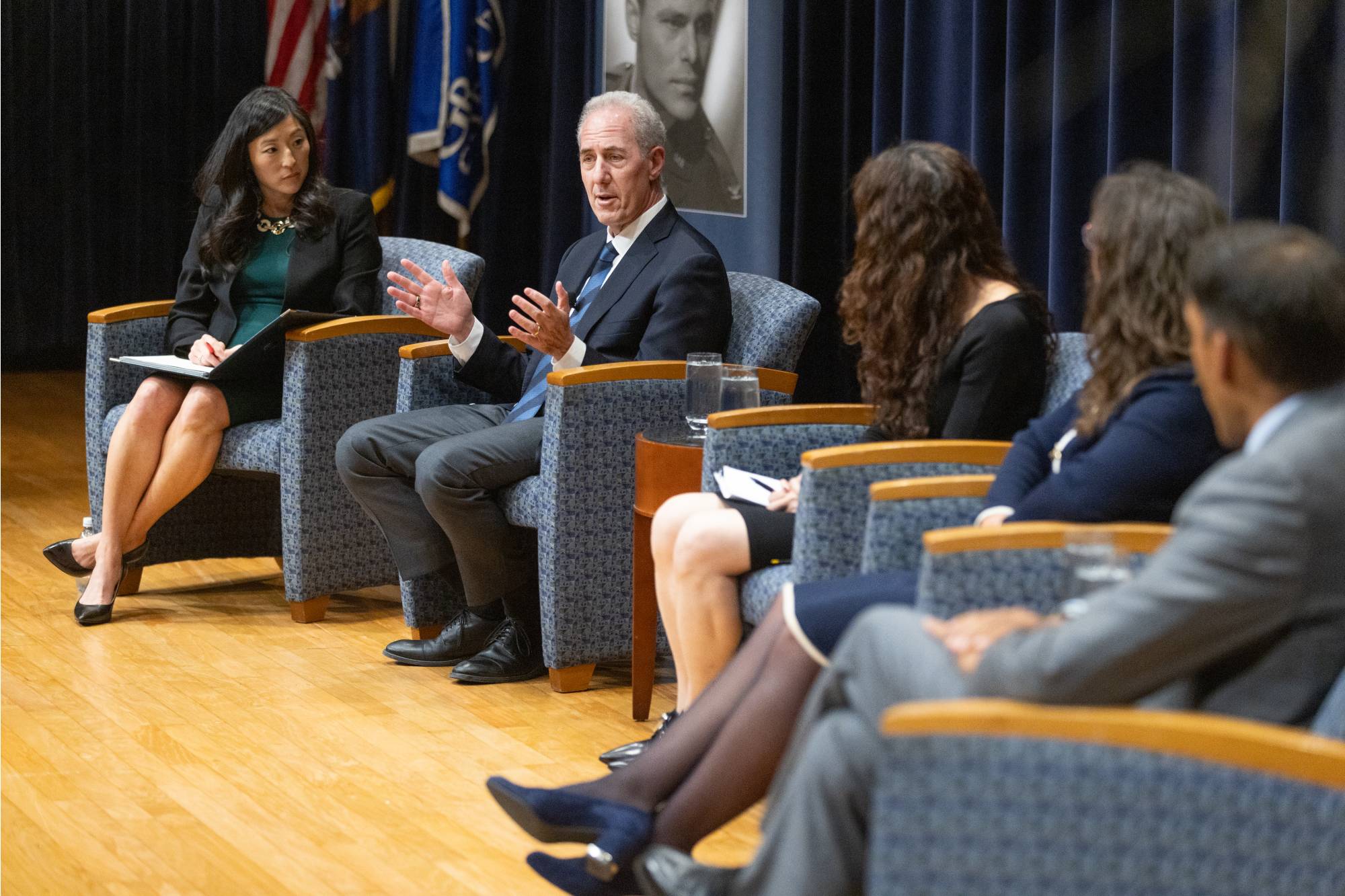 person speaking at a podium